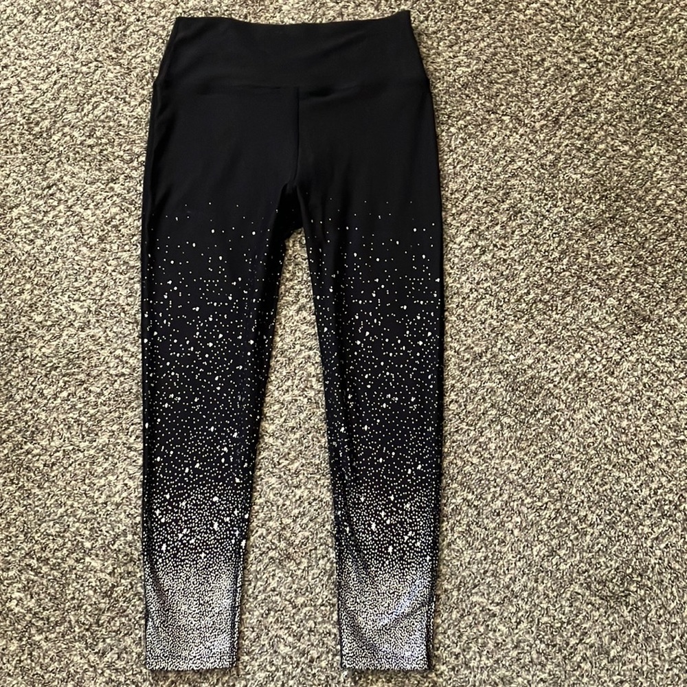 Betsy Johnson. Black leggings with silver specks from thigh down to ankle.
